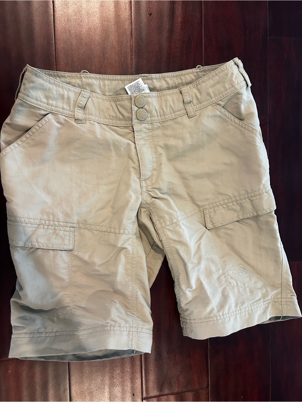 The North Face Beige Women's Shorts with Red Logo Tab